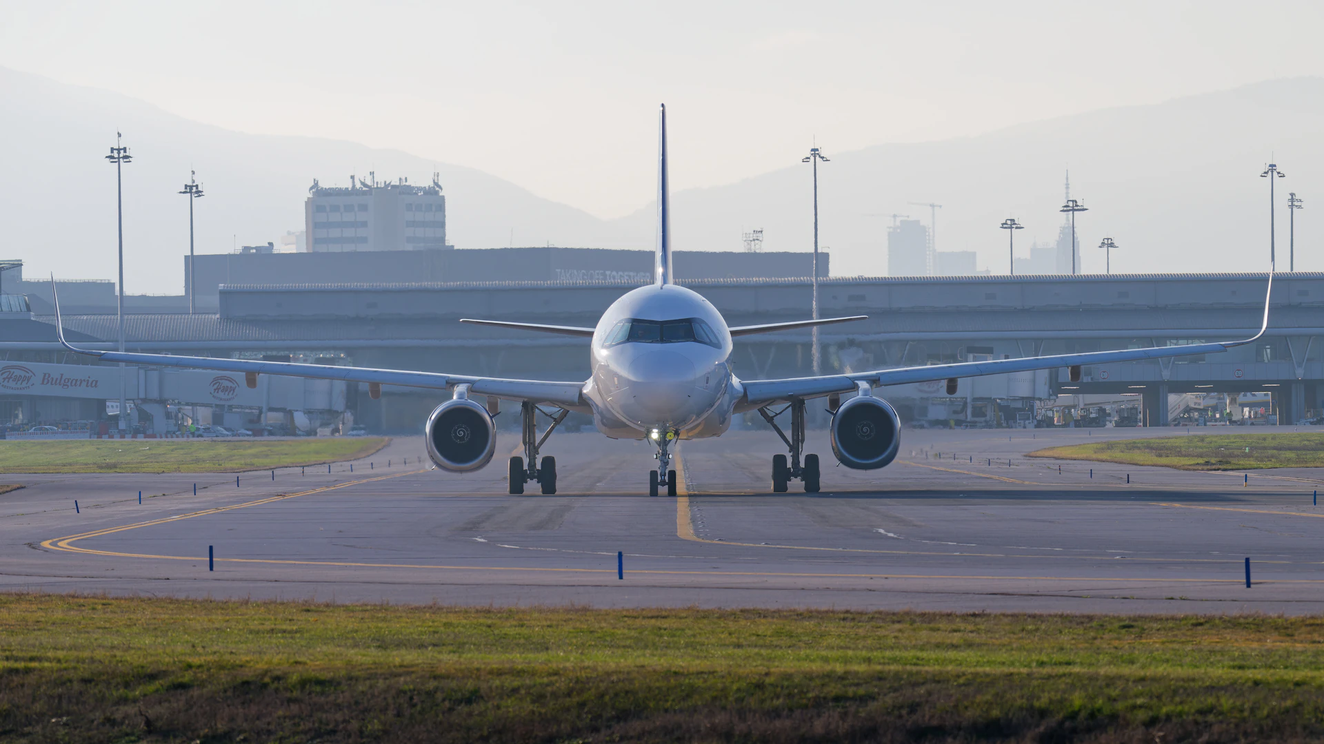 Passenger aircraft taxiing at an airport