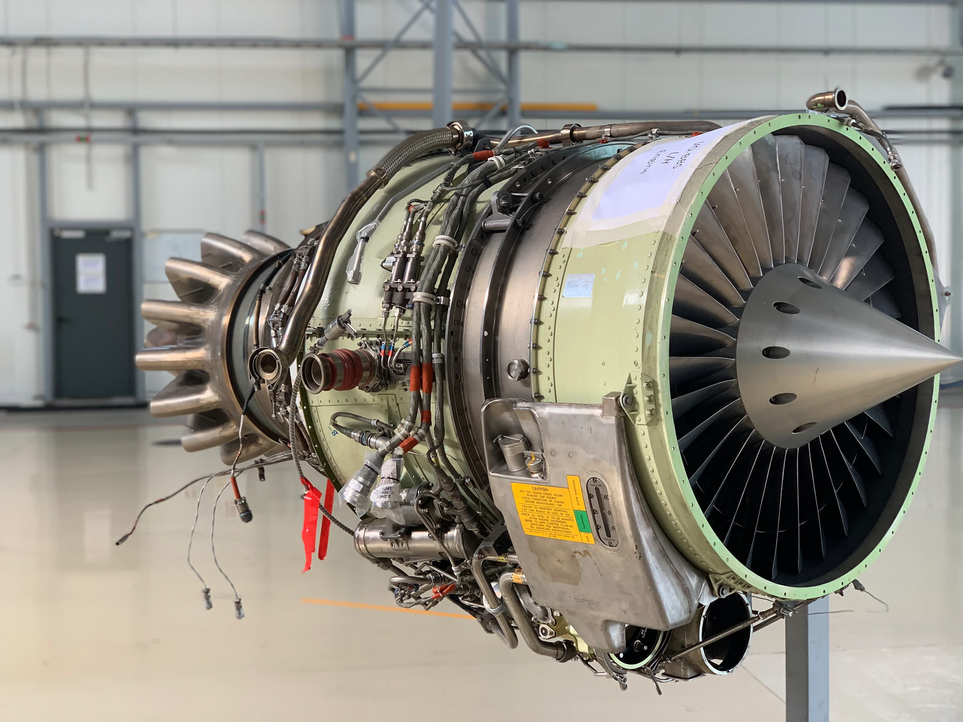 Exposed aircraft engine assembly and mechanical components